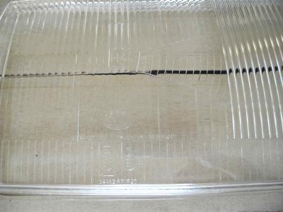 0028269190 Headlight lens right H4 Hella W123