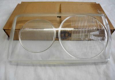 1238260590 Scheinwerferglas links Hella W123