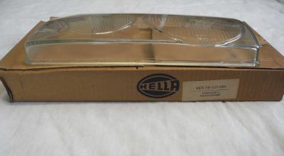 1238260590 Scheinwerferglas links Hella W123