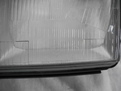 1248205566 Left headlight lens Hella W124