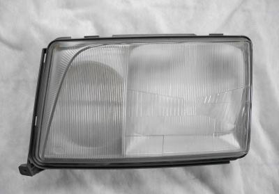 1248205566 Left headlight lens Hella W124