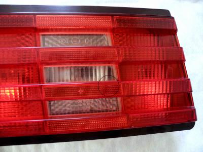 1298201764 Left taillight with rear fog light